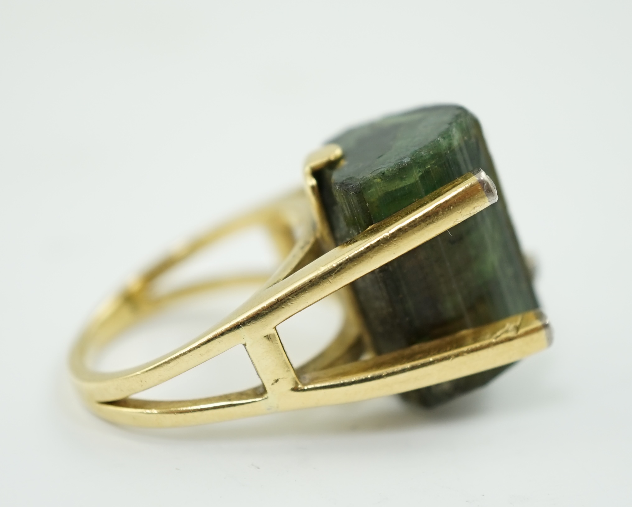 An early 1970's 18ct gold, raw cut watermelon tourmaline? and four stone diamond chip set dress ring